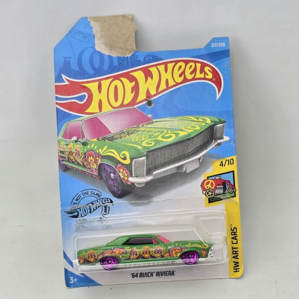 Hot Wheels '64 Buick Riviera verde con diseño de calaveras de azúcar, nuevo en empaque. by Remates Narvaja