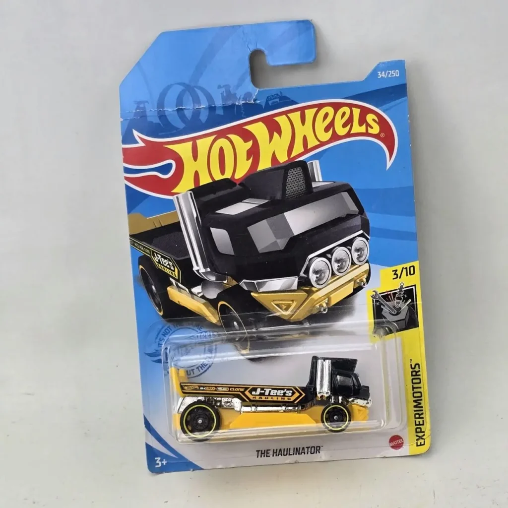 Hot Wheels The Haulinator camión de juguete negro y amarillo en blister. by Remates Narvaja