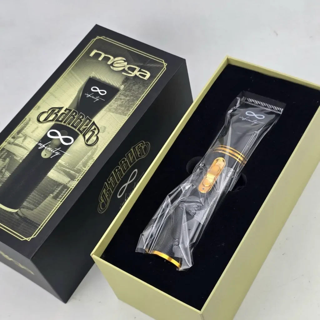 Máquina de cortar pelo profesional MEGA BARBER infinity en su caja negra y dorada. by Remates Narvaja