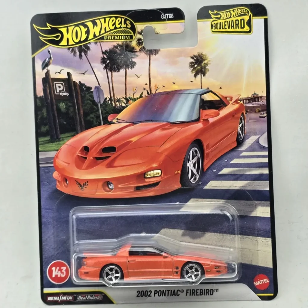 Hot Wheels Premium Boulevard 2002 Pontiac Firebird naranja en su empaque. by Remates Narvaja