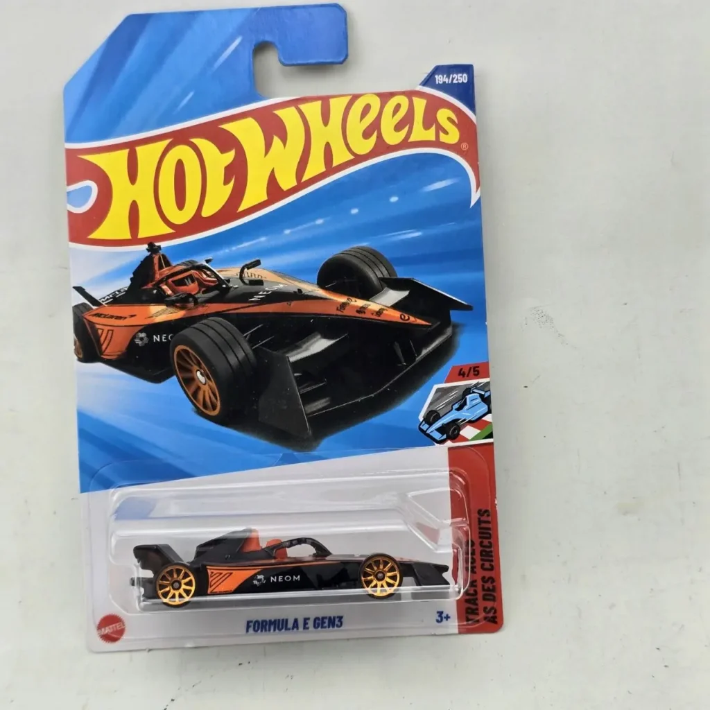 Hot Wheels Formula E Gen3 negro y naranja con ruedas doradas, nuevo en su empaque. by Remates Narvaja