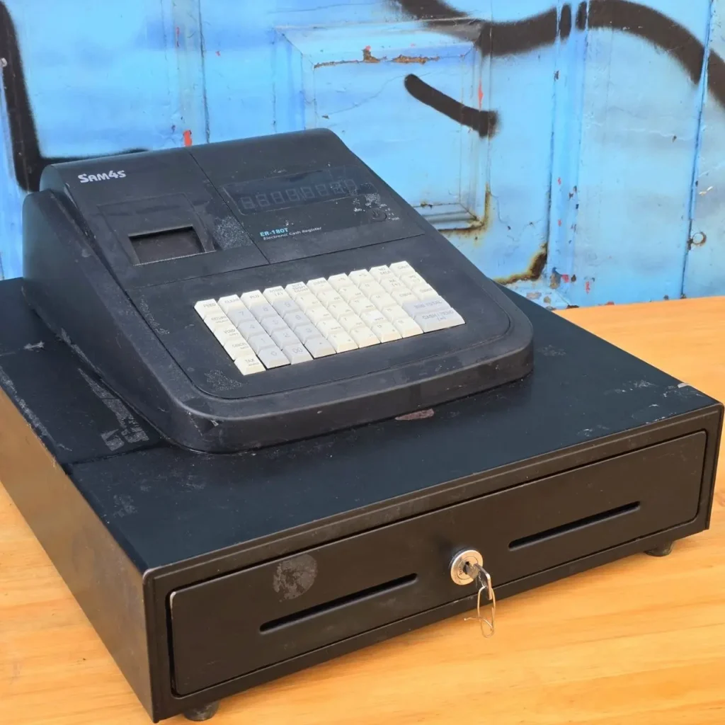 Caja registradora electrónica SAM4S ER-180T negra con cajón de dinero y llave. by Remates Narvaja