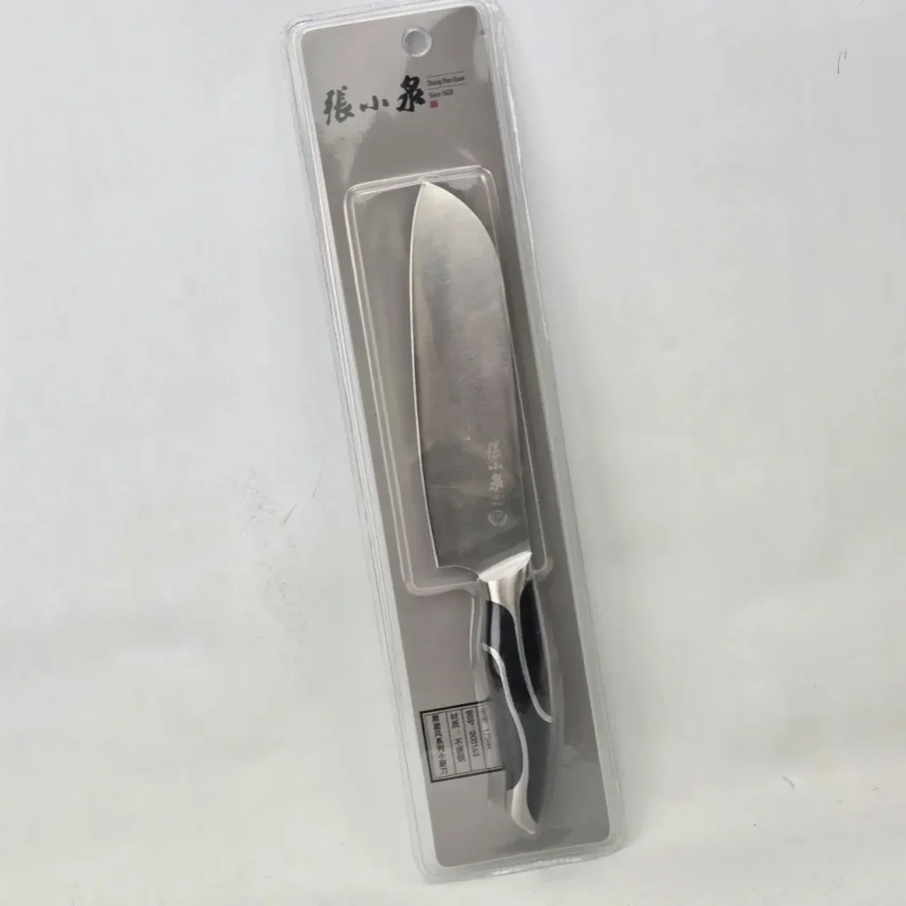 Cuchillo de cocina Zhang Xiao Quan con hoja de acero inoxidable y mango negro, en su empaque sellado. by Remates Narvaja
