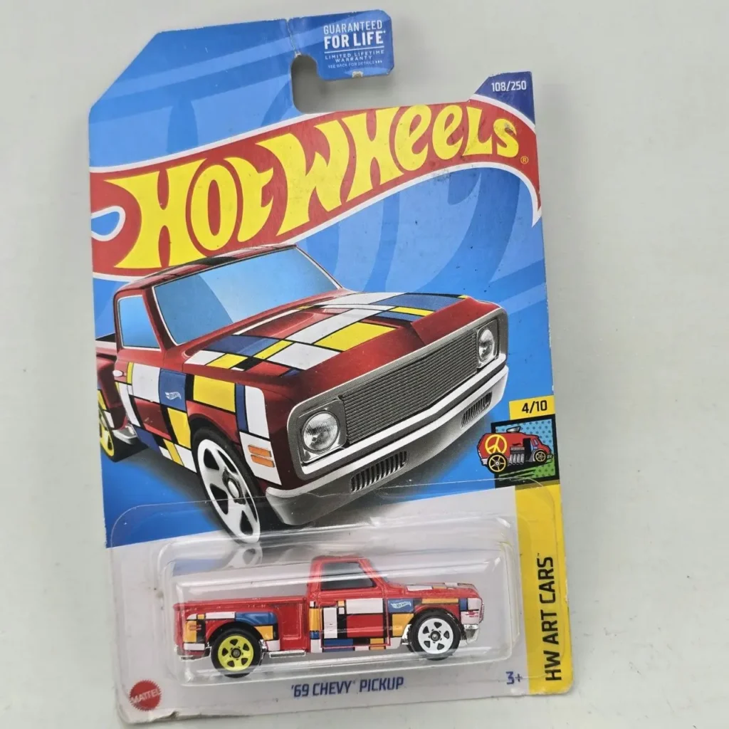 Hot Wheels '69 Chevy Pickup rojo con diseño Art Car, nuevo en paquete. by Remates Narvaja