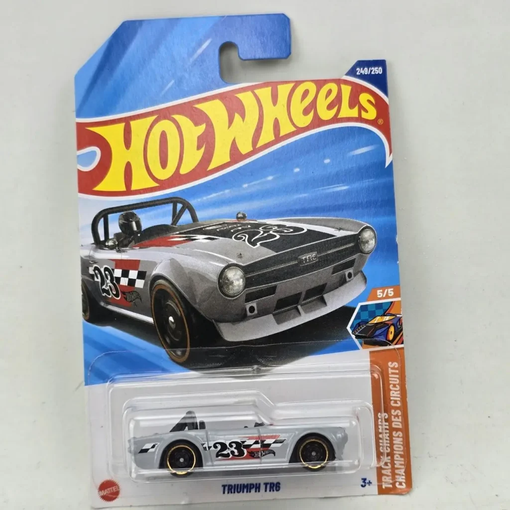 Hot Wheels Triumph TR6 gris en su empaque original, serie 249/250 Track Champs. by Remates Narvaja