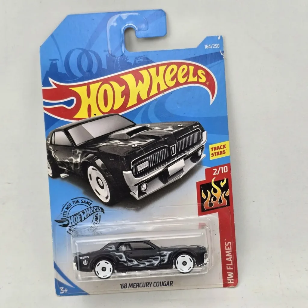 Hot Wheels '68 Mercury Cougar negro con llamas, en su empaque original. by Remates Narvaja