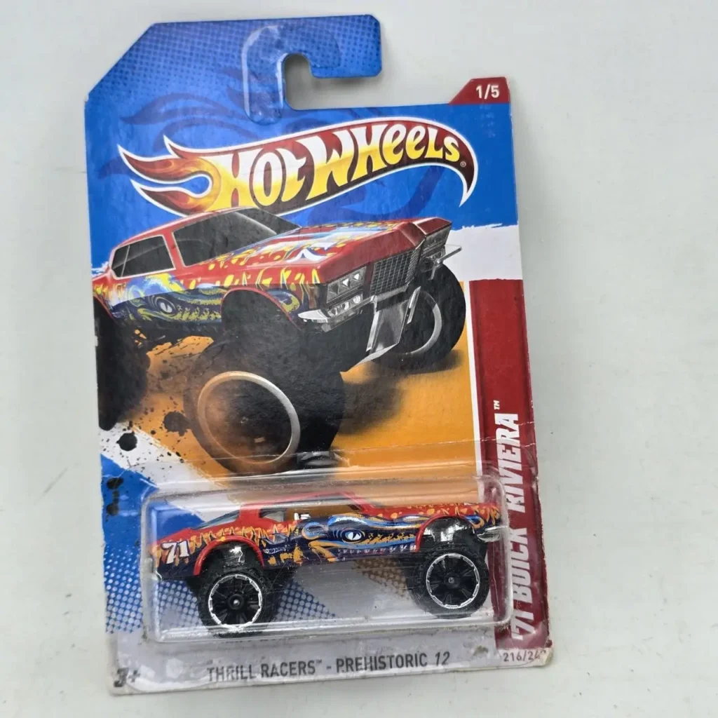 Hot Wheels '71 Buick Riviera monster truck, Thrill Racers Prehistoric, red with colorful graphics, new in package. by Remates Narvaja