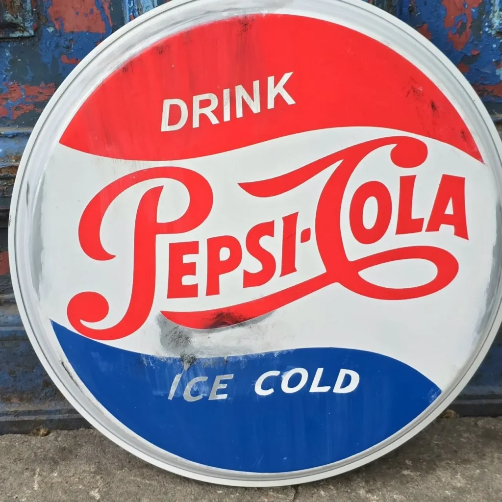 Señal redonda vintage de Pepsi-Cola roja, blanca y azul con el texto "Drink Pepsi-Cola Ice Cold". by Remates Narvaja