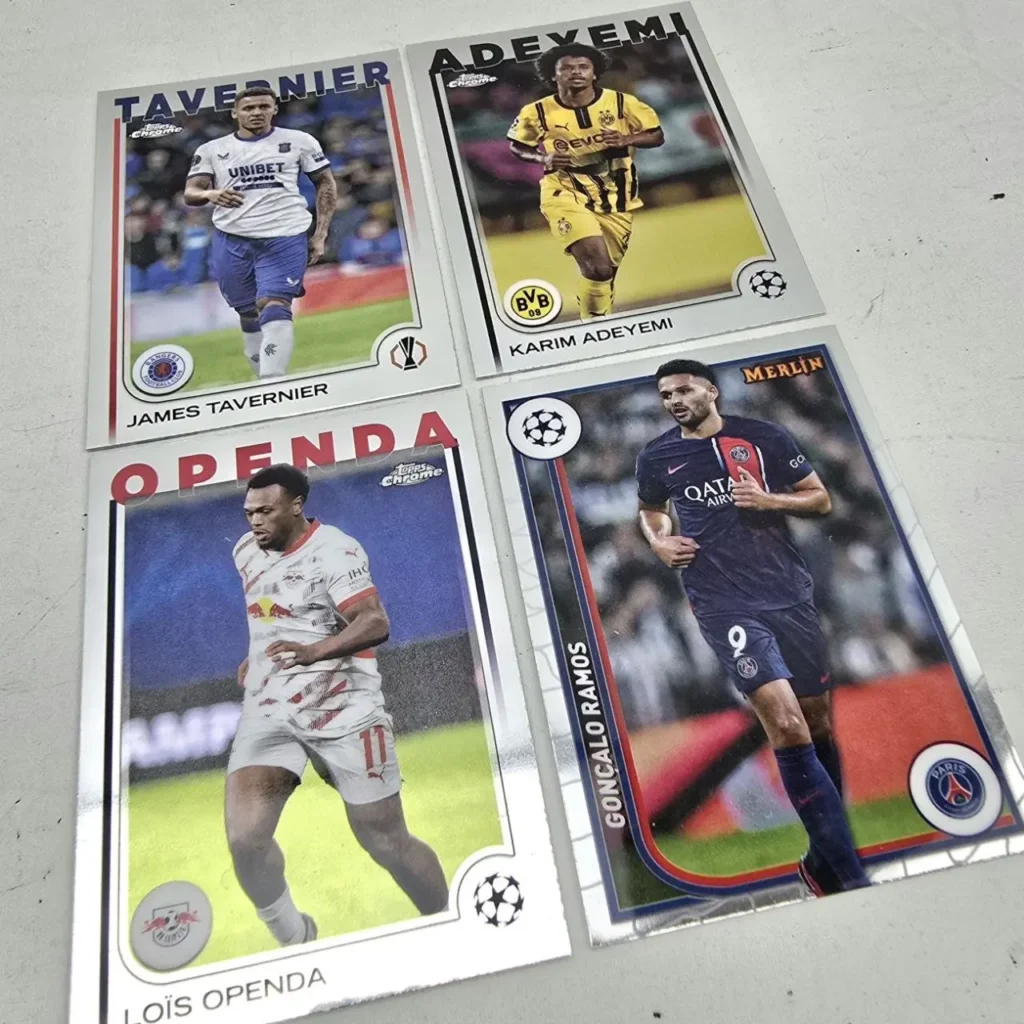 Cuatro cartas de fútbol Topps Chrome y Merlin de James Tavernier, Karim Adeyemi, Loïs Openda y Gonçalo Ramos by Remates Narvaja