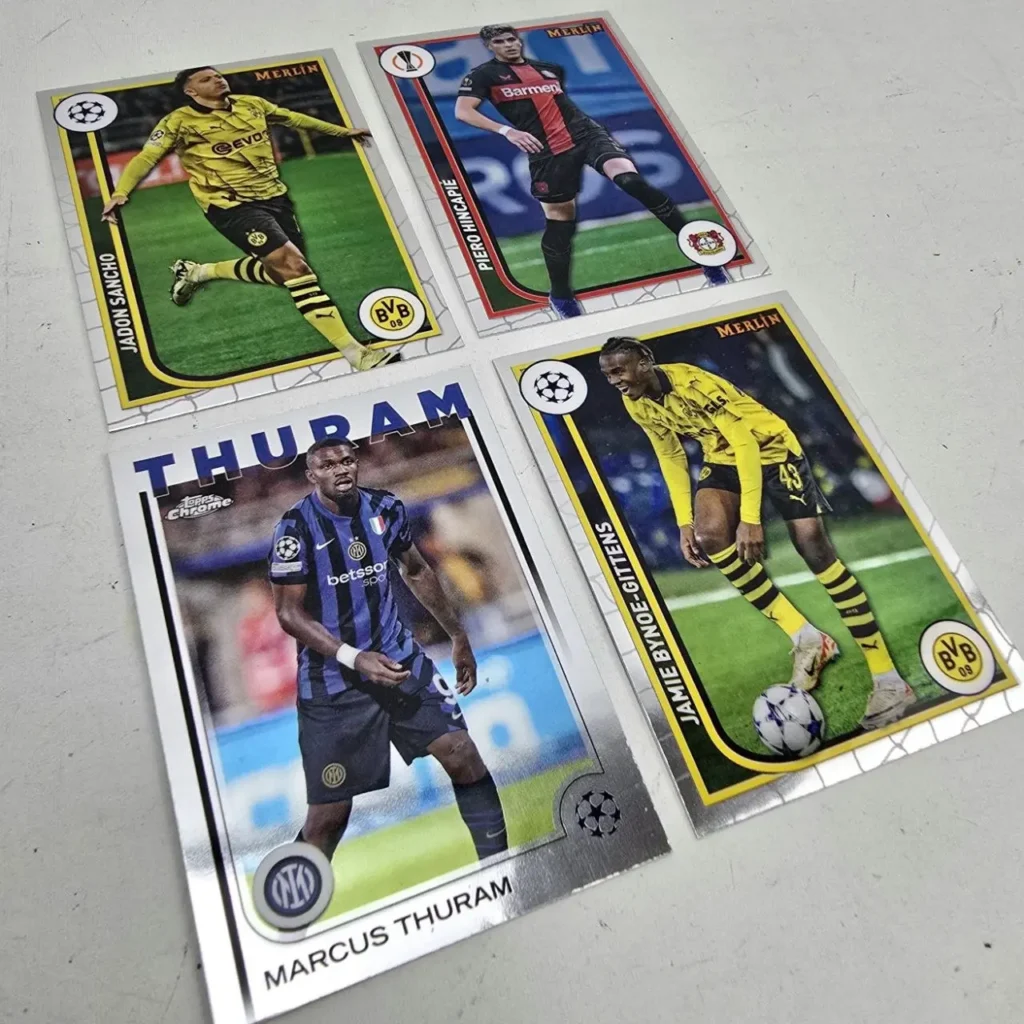 Cromos de fútbol Topps Chrome Merlin UEFA Champions League con Jadon Sancho, Marcus Thuram, Piero Hincapie y Jamie Bynoe-Gittens. by Remates Narvaja
