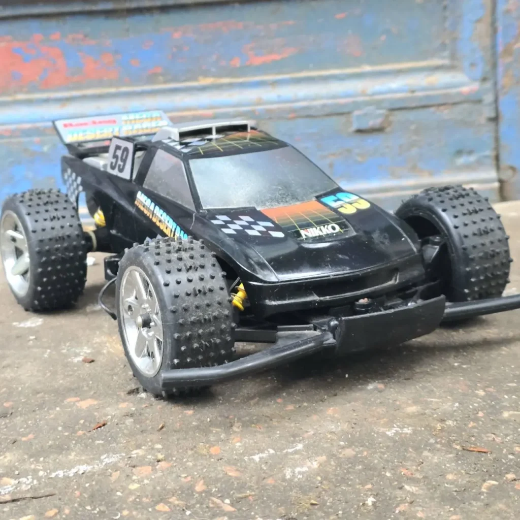 Coche RC Nikko Mega Desert negro con el número 59. by Remates Narvaja